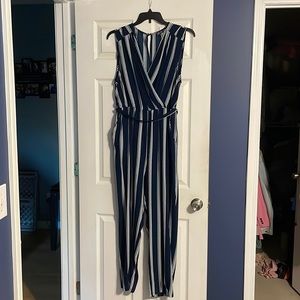 Blue and white striped tank top romper. Has pockets